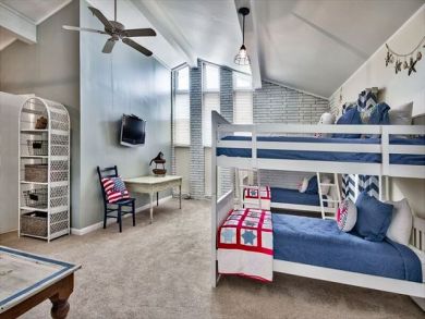 Bedroom with Two Sets of Bunk Beds